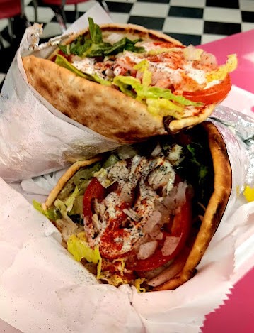 Gyro sandwiches with vegetables and sauce